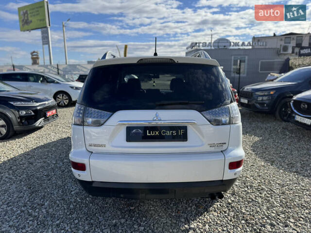 Белый Мицубиси Аутлендер, объемом двигателя 2.18 л и пробегом 271 тыс. км за 8700 $, фото 9 на Automoto.ua
