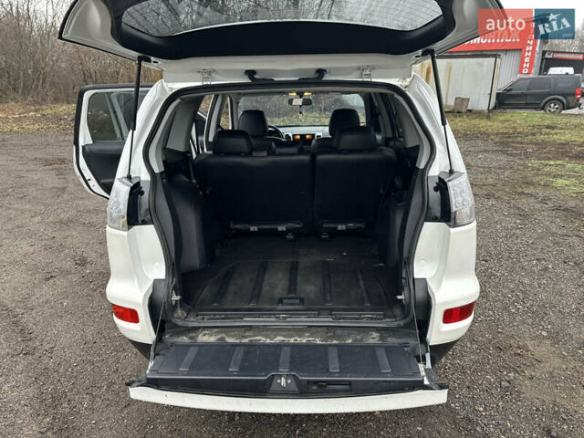 Белый Мицубиси Аутлендер, объемом двигателя 2.2 л и пробегом 266 тыс. км за 9300 $, фото 16 на Automoto.ua