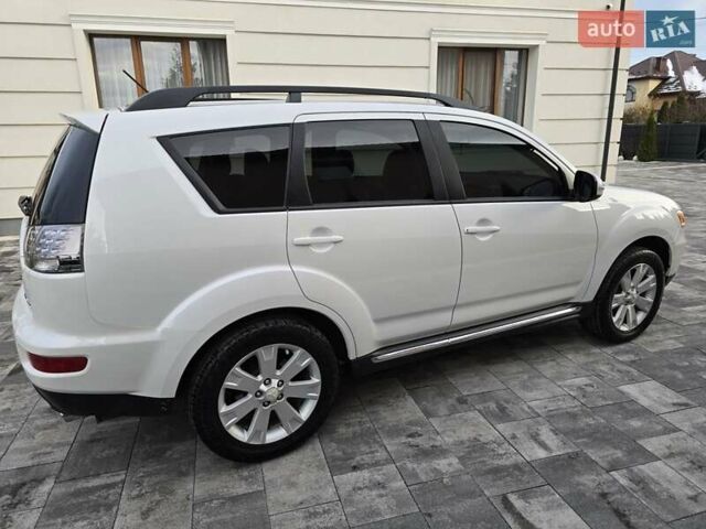 Білий Міцубісі Аутлендер, об'ємом двигуна 2.36 л та пробігом 178 тис. км за 10200 $, фото 8 на Automoto.ua