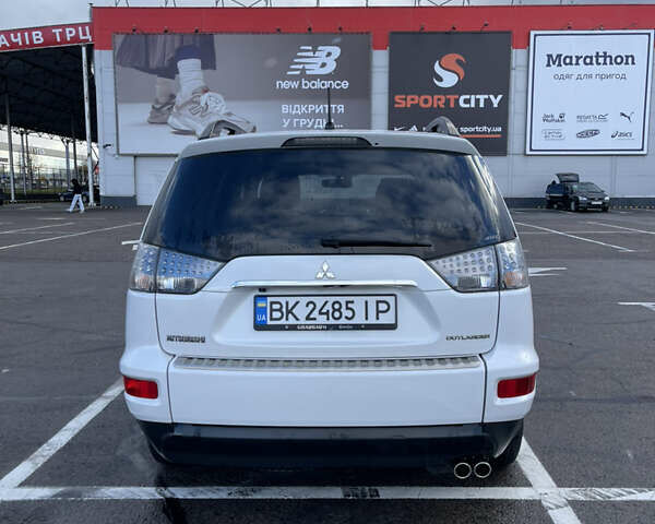 Білий Міцубісі Аутлендер, об'ємом двигуна 2.18 л та пробігом 198 тис. км за 11500 $, фото 14 на Automoto.ua
