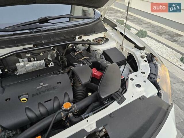 Білий Міцубісі Аутлендер, об'ємом двигуна 2.36 л та пробігом 178 тис. км за 10200 $, фото 39 на Automoto.ua