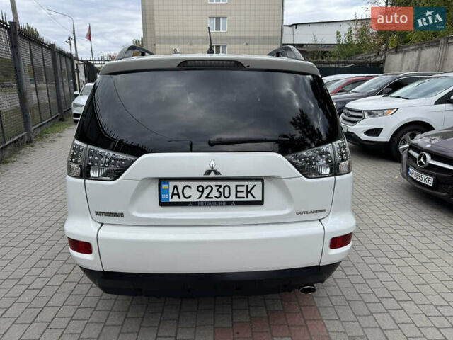 Белый Мицубиси Аутлендер, объемом двигателя 2.4 л и пробегом 212 тыс. км за 8999 $, фото 2 на Automoto.ua
