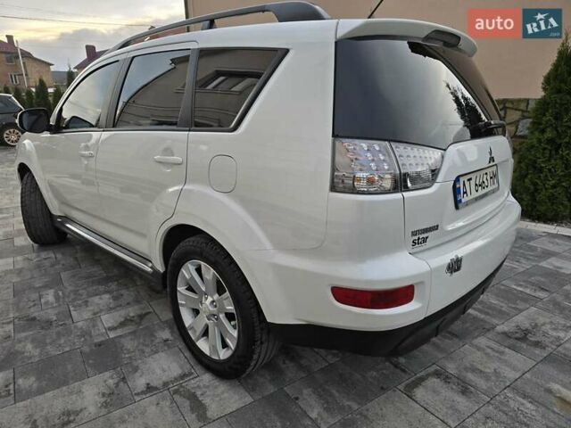 Білий Міцубісі Аутлендер, об'ємом двигуна 2.36 л та пробігом 178 тис. км за 10200 $, фото 70 на Automoto.ua
