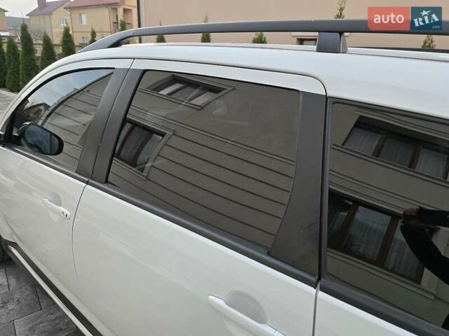 Білий Міцубісі Аутлендер, об'ємом двигуна 2.36 л та пробігом 178 тис. км за 10200 $, фото 63 на Automoto.ua