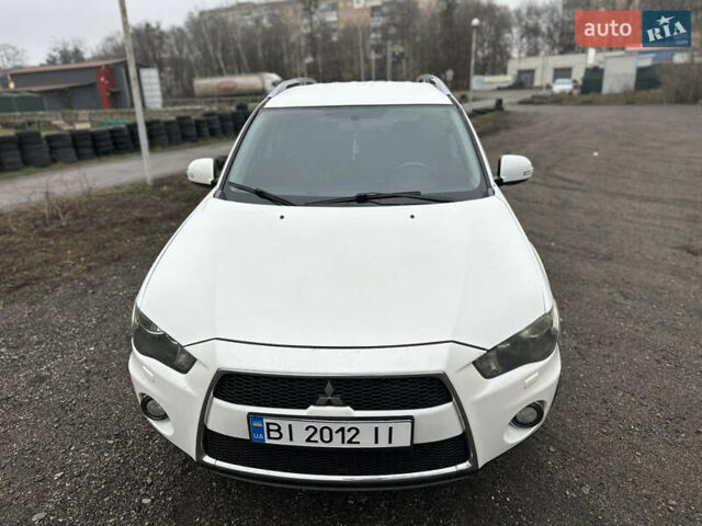 Белый Мицубиси Аутлендер, объемом двигателя 2.2 л и пробегом 266 тыс. км за 9300 $, фото 6 на Automoto.ua