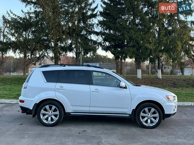 Білий Міцубісі Аутлендер, об'ємом двигуна 2.3 л та пробігом 160 тис. км за 10200 $, фото 6 на Automoto.ua