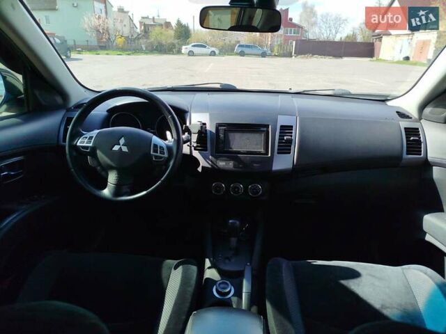 Белый Мицубиси Аутлендер, объемом двигателя 2.4 л и пробегом 157 тыс. км за 11000 $, фото 24 на Automoto.ua