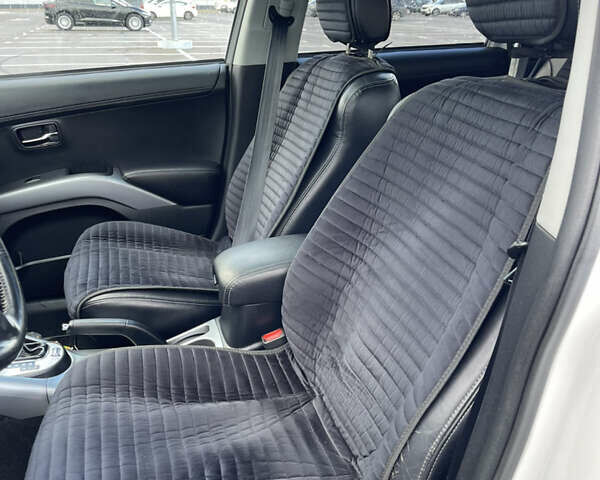 Білий Міцубісі Аутлендер, об'ємом двигуна 2.18 л та пробігом 198 тис. км за 11500 $, фото 32 на Automoto.ua