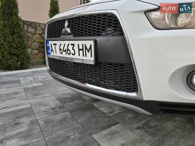 Білий Міцубісі Аутлендер, об'ємом двигуна 2.36 л та пробігом 178 тис. км за 10200 $, фото 46 на Automoto.ua