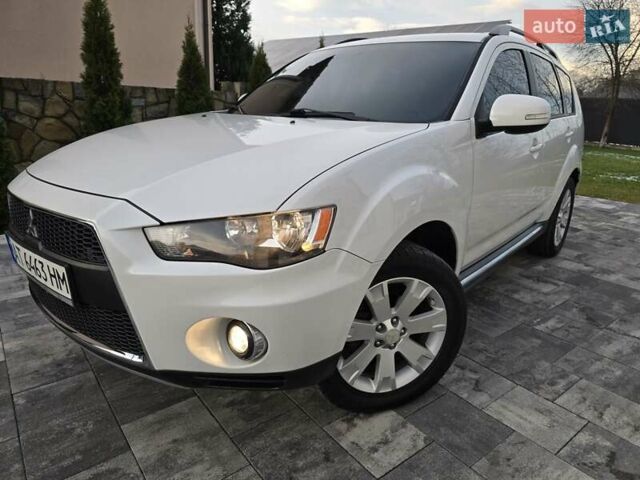 Білий Міцубісі Аутлендер, об'ємом двигуна 2.36 л та пробігом 178 тис. км за 10200 $, фото 66 на Automoto.ua
