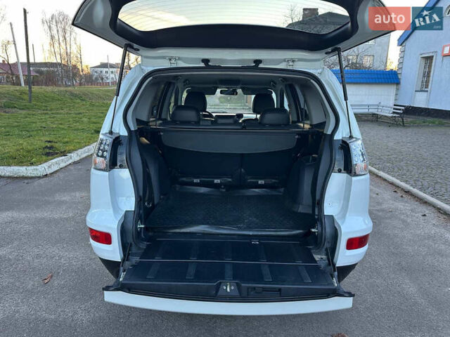 Білий Міцубісі Аутлендер, об'ємом двигуна 2.3 л та пробігом 160 тис. км за 10200 $, фото 14 на Automoto.ua