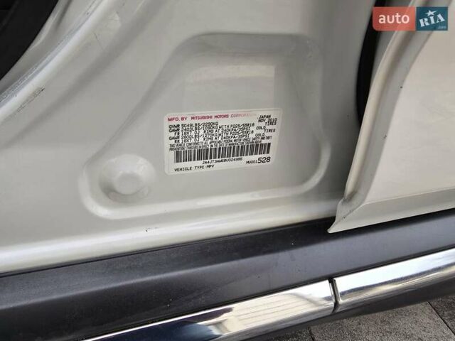 Білий Міцубісі Аутлендер, об'ємом двигуна 2.36 л та пробігом 178 тис. км за 10200 $, фото 22 на Automoto.ua
