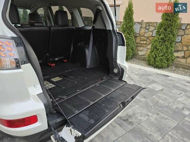 Білий Міцубісі Аутлендер, об'ємом двигуна 2.36 л та пробігом 178 тис. км за 10200 $, фото 35 на Automoto.ua