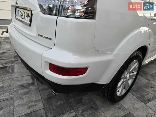 Білий Міцубісі Аутлендер, об'ємом двигуна 2.36 л та пробігом 178 тис. км за 10200 $, фото 57 на Automoto.ua