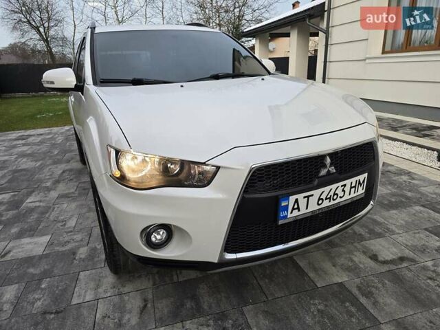 Білий Міцубісі Аутлендер, об'ємом двигуна 2.36 л та пробігом 178 тис. км за 10200 $, фото 11 на Automoto.ua