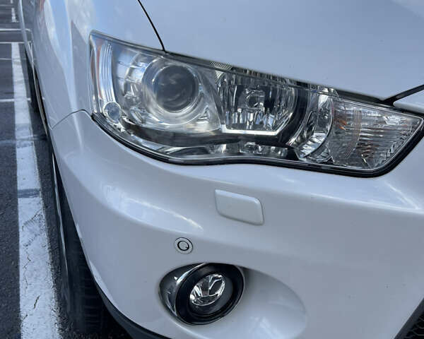 Білий Міцубісі Аутлендер, об'ємом двигуна 2.18 л та пробігом 198 тис. км за 11500 $, фото 20 на Automoto.ua