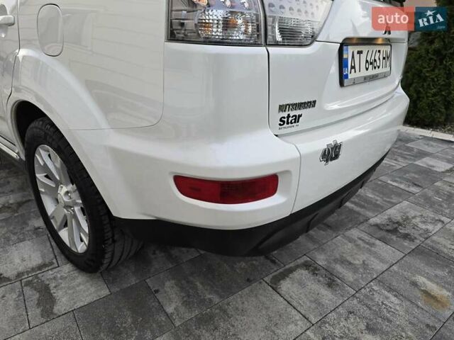 Білий Міцубісі Аутлендер, об'ємом двигуна 2.36 л та пробігом 178 тис. км за 10200 $, фото 61 на Automoto.ua
