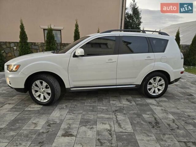Білий Міцубісі Аутлендер, об'ємом двигуна 2.36 л та пробігом 178 тис. км за 10200 $, фото 69 на Automoto.ua
