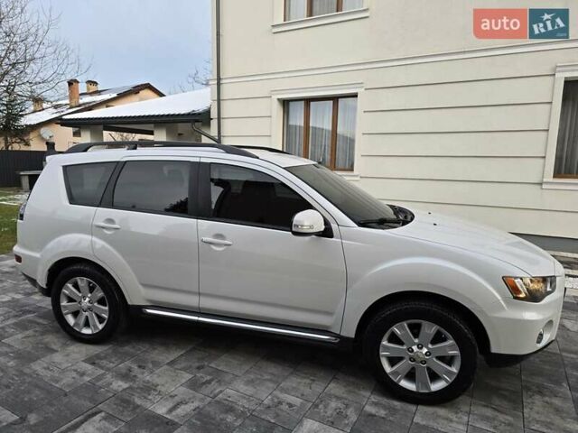 Білий Міцубісі Аутлендер, об'ємом двигуна 2.36 л та пробігом 178 тис. км за 10200 $, фото 9 на Automoto.ua