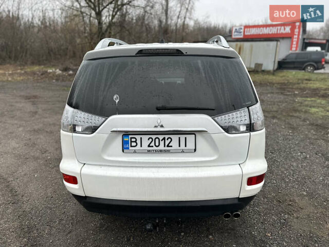 Белый Мицубиси Аутлендер, объемом двигателя 2.2 л и пробегом 266 тыс. км за 9300 $, фото 9 на Automoto.ua