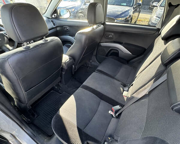 Белый Мицубиси Аутлендер, объемом двигателя 2.18 л и пробегом 271 тыс. км за 8700 $, фото 18 на Automoto.ua