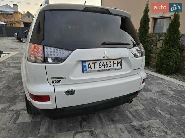 Білий Міцубісі Аутлендер, об'ємом двигуна 2.36 л та пробігом 178 тис. км за 10200 $, фото 6 на Automoto.ua