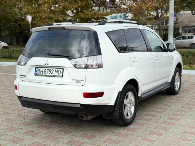 Білий Міцубісі Аутлендер, об'ємом двигуна 2 л та пробігом 165 тис. км за 8999 $, фото 6 на Automoto.ua