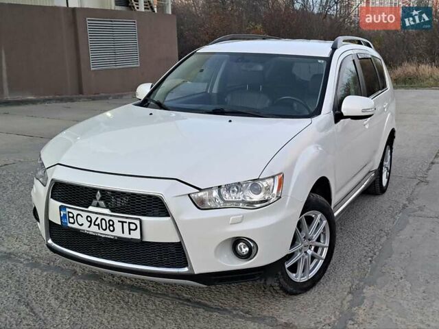 Белый Мицубиси Аутлендер, объемом двигателя 2.27 л и пробегом 191 тыс. км за 10999 $, фото 14 на Automoto.ua