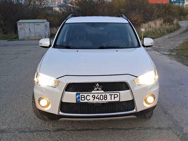 Белый Мицубиси Аутлендер, объемом двигателя 2.27 л и пробегом 191 тыс. км за 10999 $, фото 31 на Automoto.ua