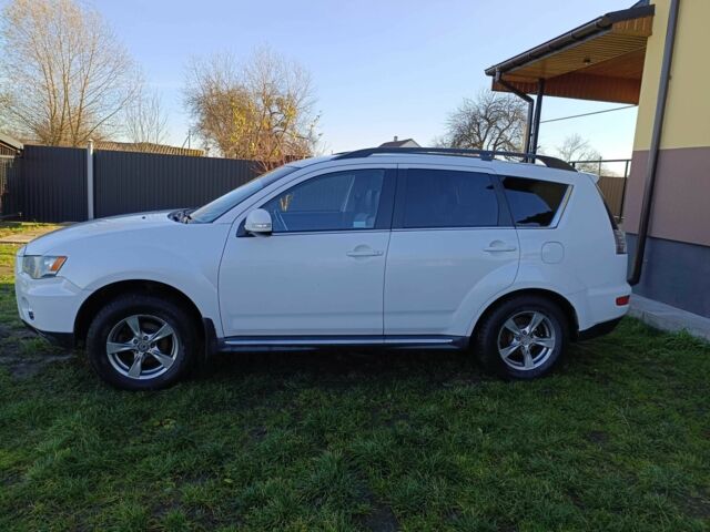 Белый Мицубиси Аутлендер, объемом двигателя 2.2 л и пробегом 232 тыс. км за 11100 $, фото 3 на Automoto.ua