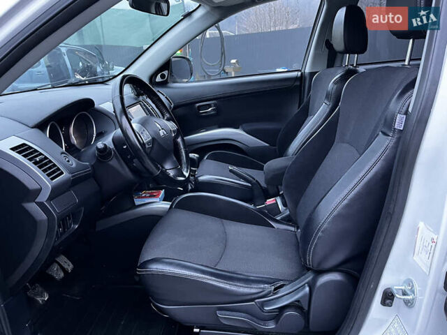 Белый Мицубиси Аутлендер, объемом двигателя 2.3 л и пробегом 161 тыс. км за 11150 $, фото 28 на Automoto.ua