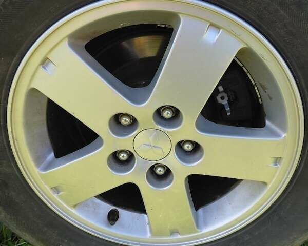 Білий Міцубісі Аутлендер, об'ємом двигуна 2.3 л та пробігом 288 тис. км за 12000 $, фото 10 на Automoto.ua