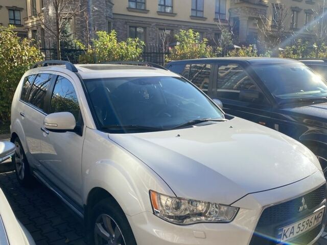 Белый Мицубиси Аутлендер, объемом двигателя 2.4 л и пробегом 154 тыс. км за 12500 $, фото 2 на Automoto.ua