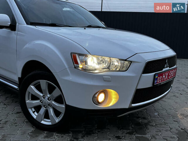 Белый Мицубиси Аутлендер, объемом двигателя 2.3 л и пробегом 161 тыс. км за 11150 $, фото 5 на Automoto.ua