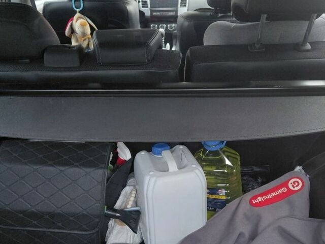 Білий Міцубісі Аутлендер, об'ємом двигуна 2.3 л та пробігом 286 тис. км за 12000 $, фото 15 на Automoto.ua