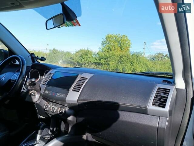 Білий Міцубісі Аутлендер, об'ємом двигуна 2.36 л та пробігом 168 тис. км за 12300 $, фото 30 на Automoto.ua