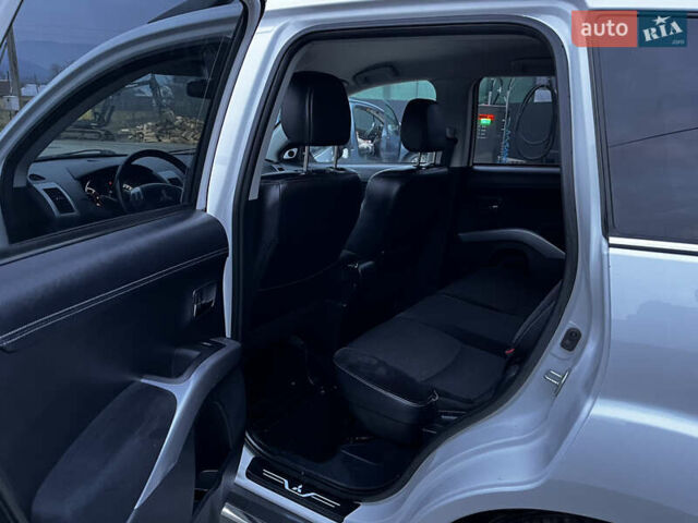 Белый Мицубиси Аутлендер, объемом двигателя 2.3 л и пробегом 161 тыс. км за 11150 $, фото 29 на Automoto.ua