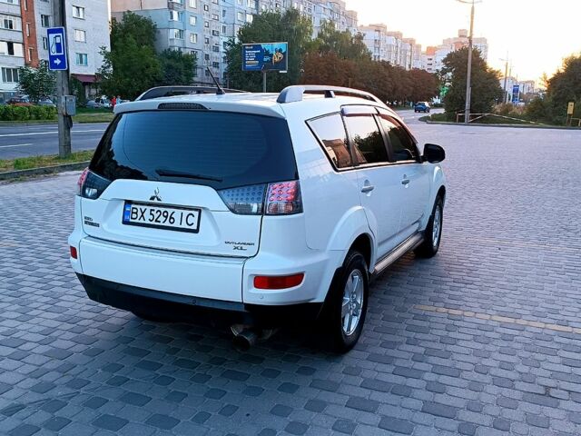 Белый Мицубиси Аутлендер, объемом двигателя 2.4 л и пробегом 187 тыс. км за 9700 $, фото 2 на Automoto.ua
