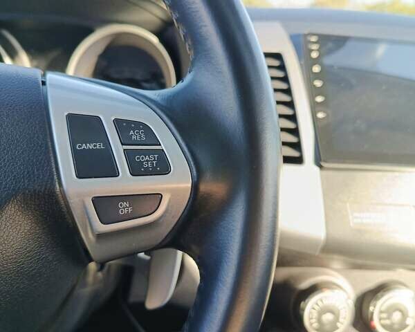 Білий Міцубісі Аутлендер, об'ємом двигуна 2.36 л та пробігом 168 тис. км за 12300 $, фото 21 на Automoto.ua