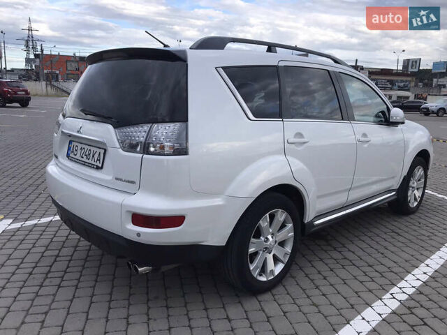 Белый Мицубиси Аутлендер, объемом двигателя 2.18 л и пробегом 285 тыс. км за 11500 $, фото 4 на Automoto.ua