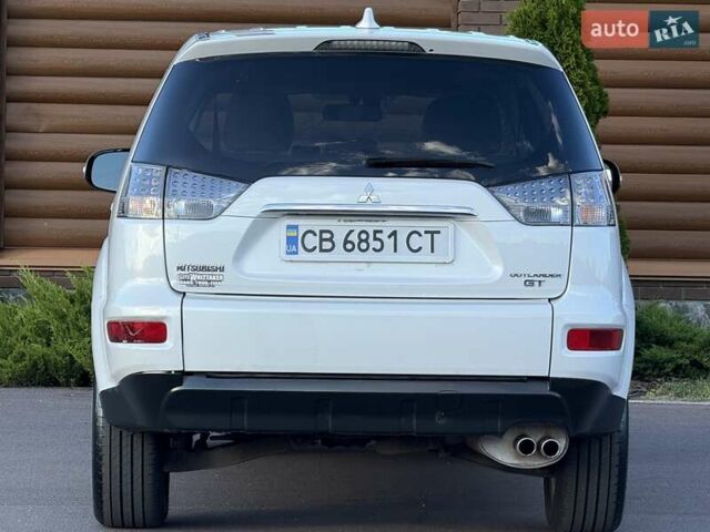 Белый Мицубиси Аутлендер, объемом двигателя 3 л и пробегом 269 тыс. км за 10500 $, фото 26 на Automoto.ua