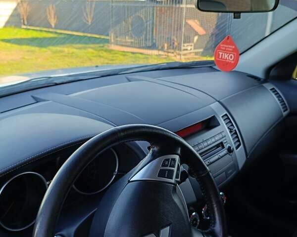 Белый Мицубиси Аутлендер, объемом двигателя 2.2 л и пробегом 232 тыс. км за 10950 $, фото 16 на Automoto.ua