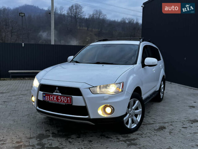 Белый Мицубиси Аутлендер, объемом двигателя 2.3 л и пробегом 161 тыс. км за 11150 $, фото 4 на Automoto.ua