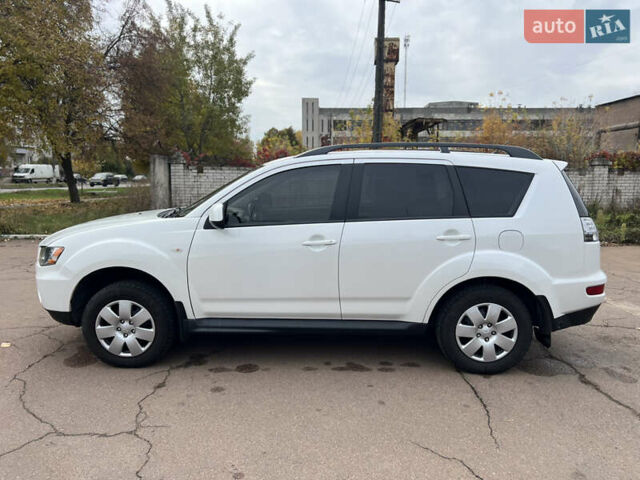Білий Міцубісі Аутлендер, об'ємом двигуна 2.36 л та пробігом 260 тис. км за 9700 $, фото 25 на Automoto.ua