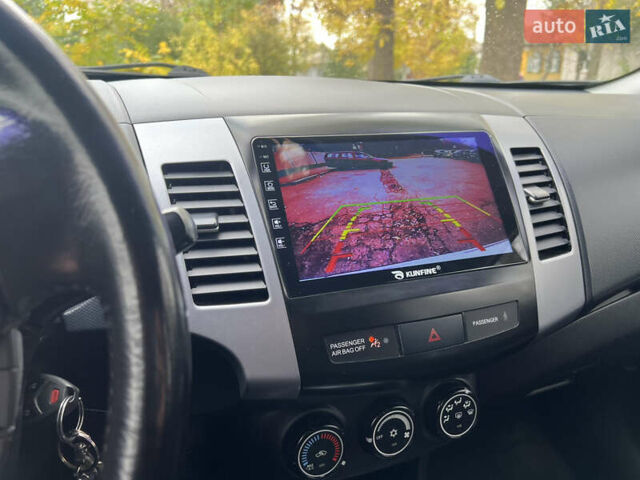 Білий Міцубісі Аутлендер, об'ємом двигуна 2.36 л та пробігом 260 тис. км за 9700 $, фото 33 на Automoto.ua