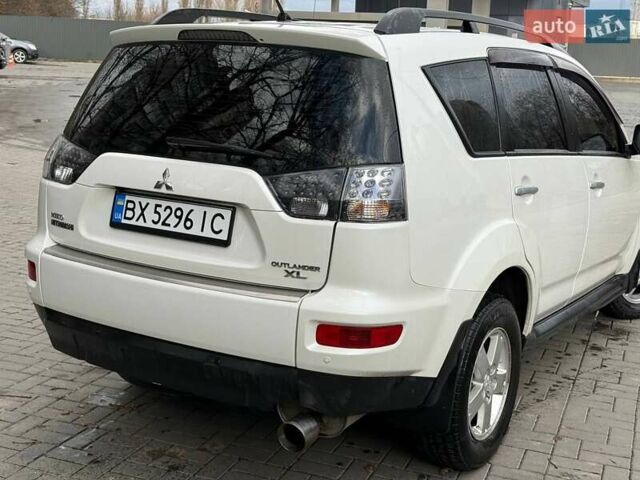 Белый Мицубиси Аутлендер, объемом двигателя 2.35 л и пробегом 192 тыс. км за 9300 $, фото 1 на Automoto.ua