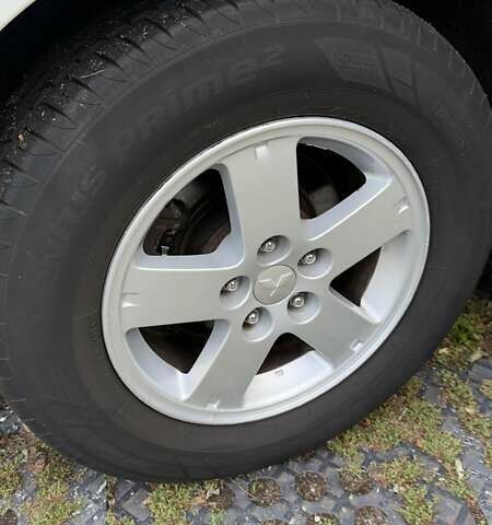 Белый Мицубиси Аутлендер, объемом двигателя 2 л и пробегом 172 тыс. км за 10999 $, фото 29 на Automoto.ua