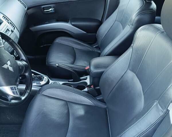 Белый Мицубиси Аутлендер, объемом двигателя 2.2 л и пробегом 232 тыс. км за 10950 $, фото 17 на Automoto.ua