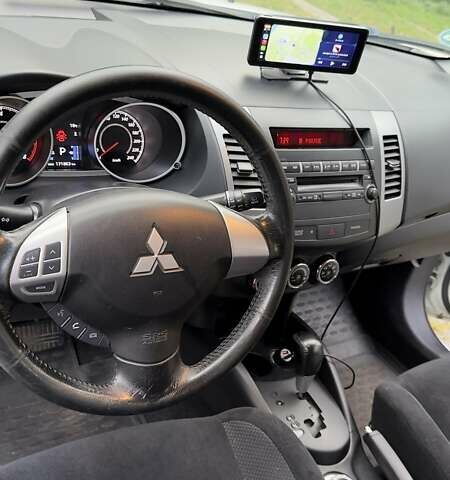 Белый Мицубиси Аутлендер, объемом двигателя 2 л и пробегом 172 тыс. км за 10999 $, фото 23 на Automoto.ua