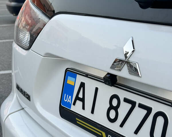 Білий Міцубісі Аутлендер, об'ємом двигуна 2 л та пробігом 187 тис. км за 12200 $, фото 5 на Automoto.ua